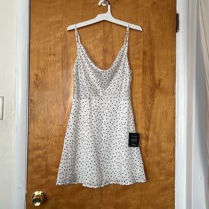 Lulus White mini dress with black polka dots and cowl neck. NWT.
